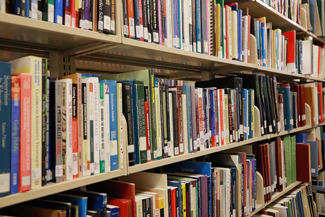 Photo of Stacks of Books in Library