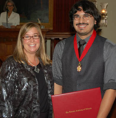 Photo of Michael Anderson receiving Lincoln Laureate Award