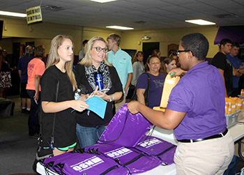 Student and Parent Checking-In at NSO