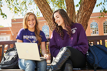 Two Female Students on Laptop