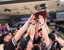 Photo of Men's Bowling Team Lifting National Trophy