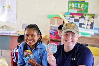 McKendree Student with Belizean Student in Classroom