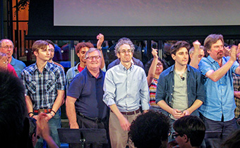 Singing onstage at New York City’s TimesCenter Theater